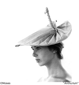 A paper hat by Moses - it looks like a lily pad!